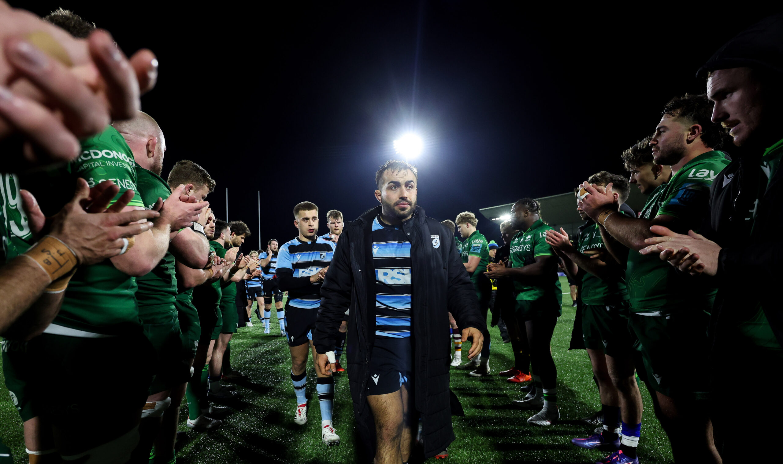 Liam Belcher leads Cardiff off the pitch at full-time